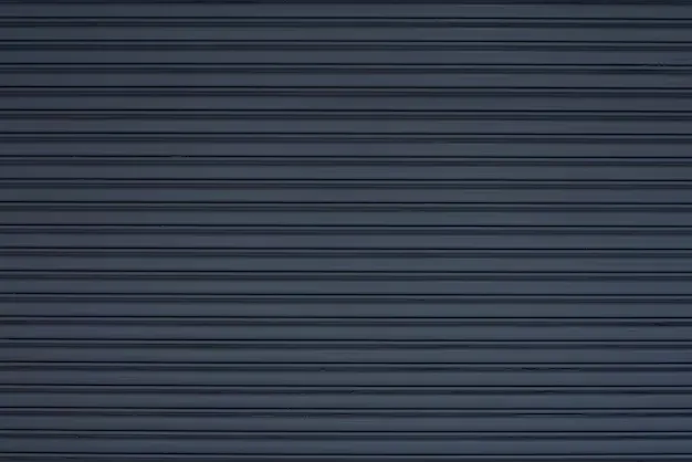 Dark horizontal slatted garage door with a sleek, modern design. -garage door covers
