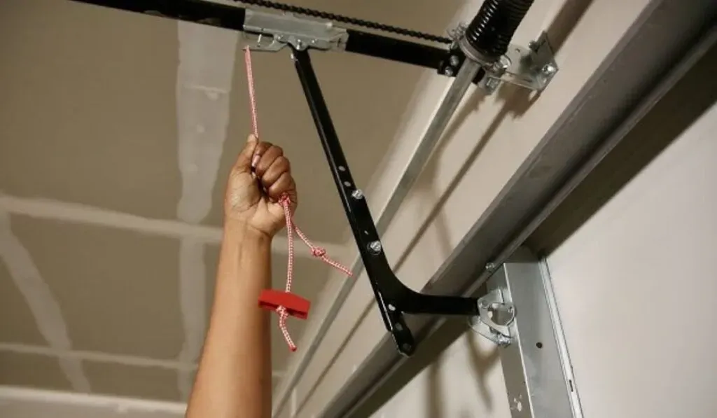 Garage Door Emergency Release Red Cord - How to Use It Safely garage door emergency release red cord safety