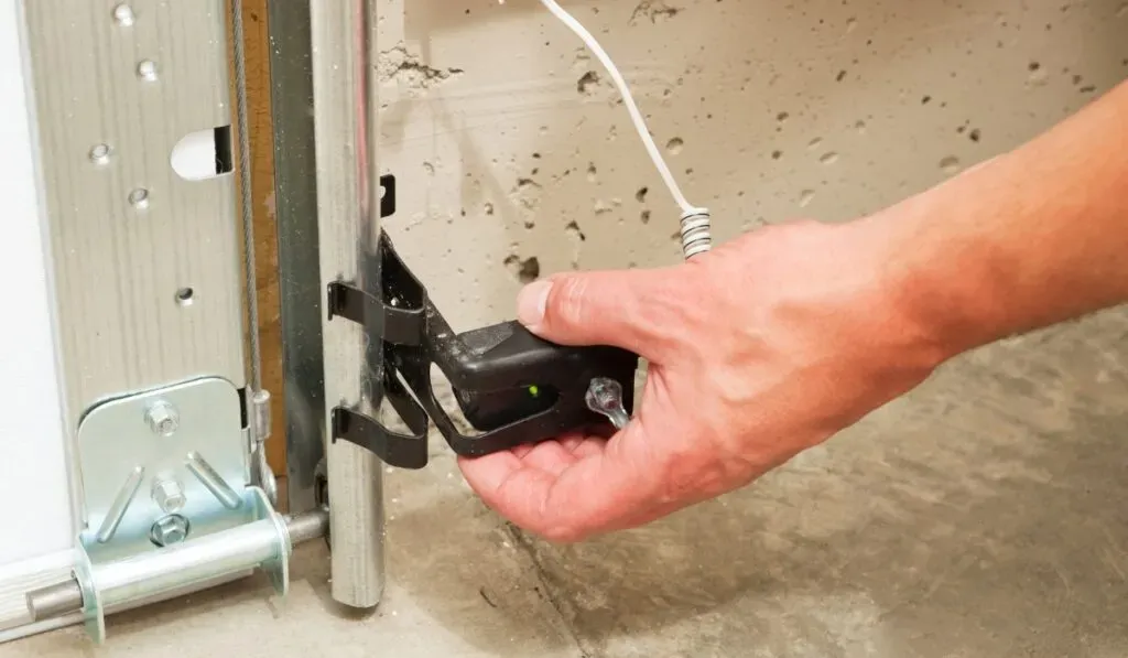 garage door safety reversal test sensor alignment